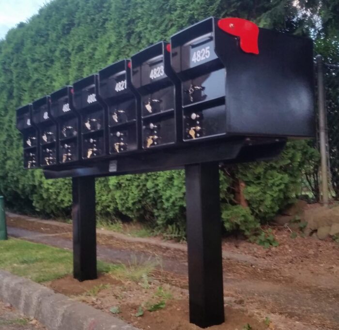 7 senator mailboxes on a rack