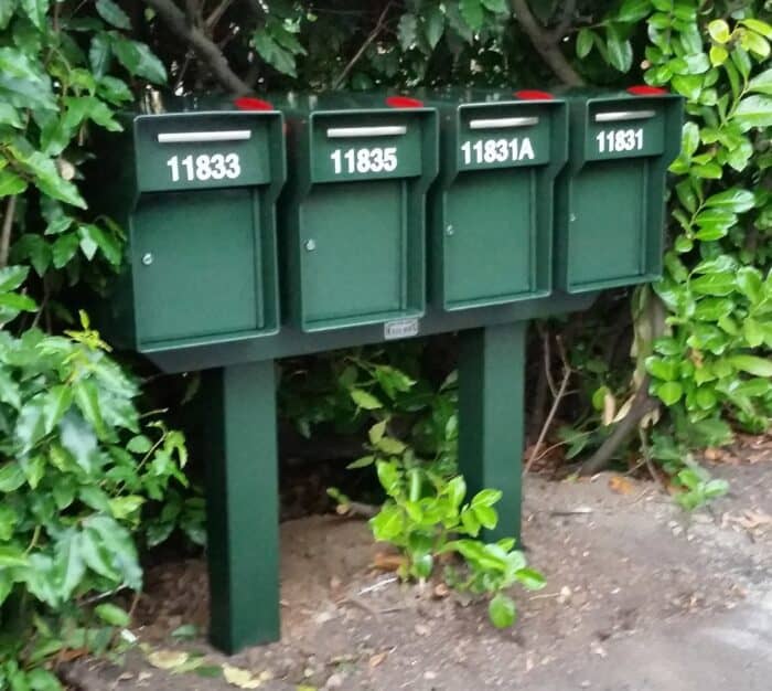 4 vacationer mailboxes with surface mount post